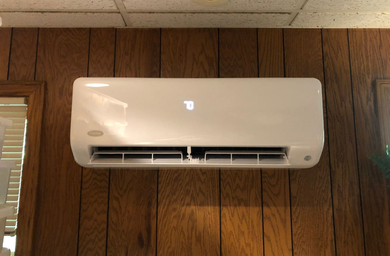 A dedicated Climate Systems team member working on an AC installation in McCandless, PA, highlighting the advantages of choosing professional service.