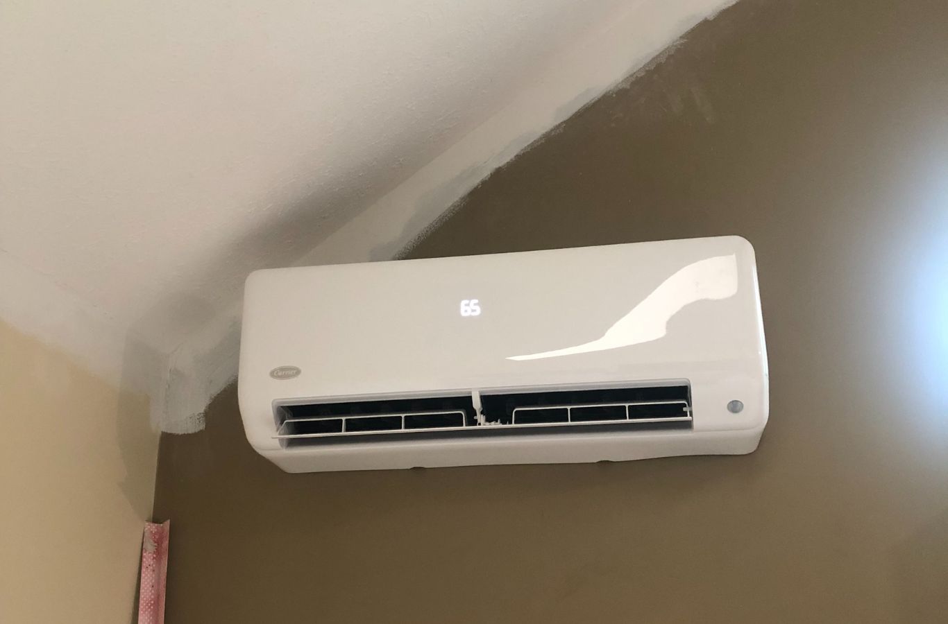 A Climate Systems team member performing AC maintenance in Mars, PA, showcasing the benefits of regular service.