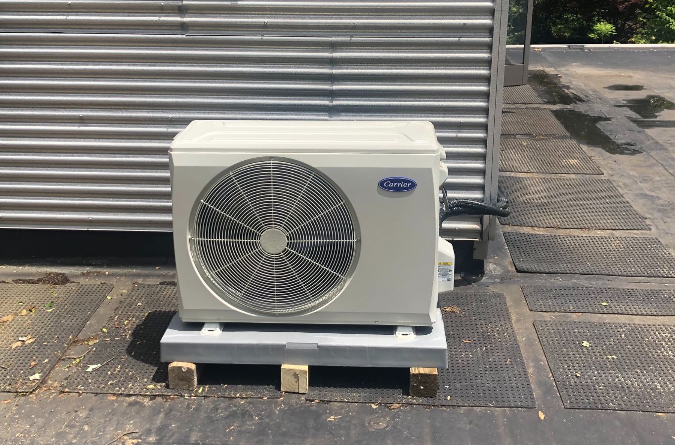 A Climate Systems expert showcasing reliable AC installation in McCandless, PA, demonstrating our commitment to quality and customer satisfaction. AC Installation near me.
