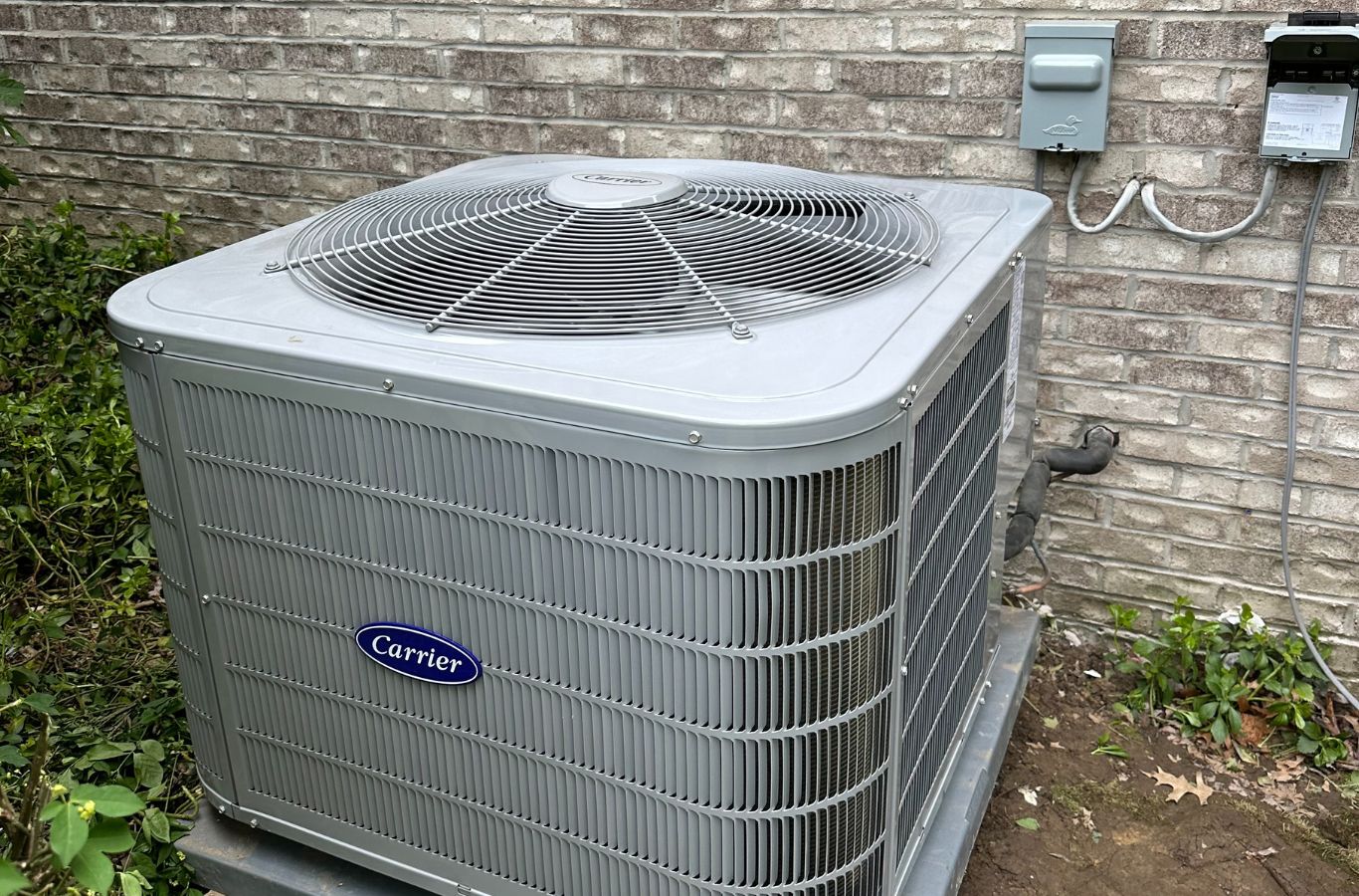 A Climate Systems team member providing heat pump repair in Cranberry Township, PA, highlighting efficient service and system performance improvement.