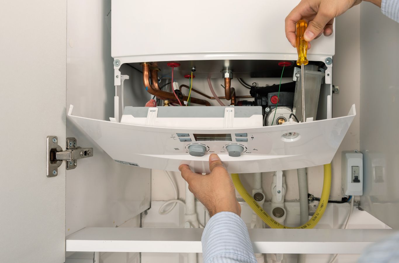 Climate Systems expert working on a residential boiler in Gibsonia, PA, highlighting efficiency, safety, and local trusted service.