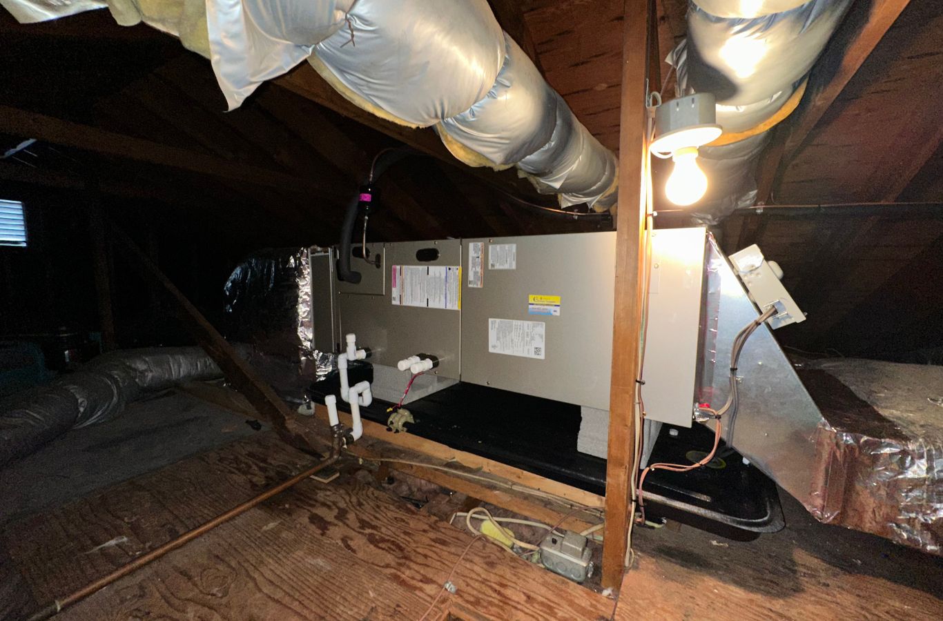 A Climate Systems expert inspecting a furnace during emergency repair in Hampton Township, PA, ensuring reliable heating performance.