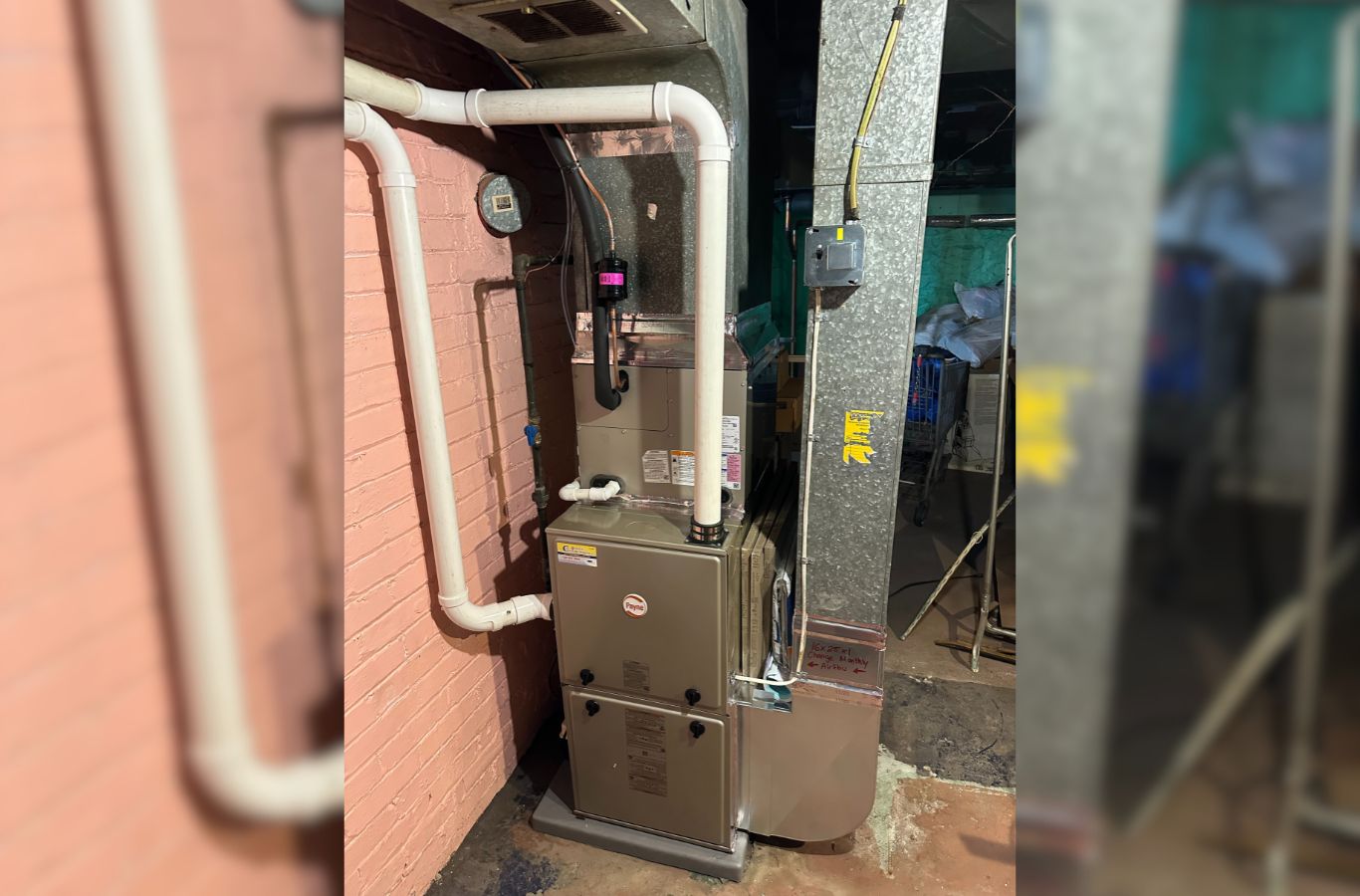A Climate Systems professional conducting emergency furnace repair in Adams Township, PA, showcasing trusted local expertise. Emergency Furnace Repair near me.
