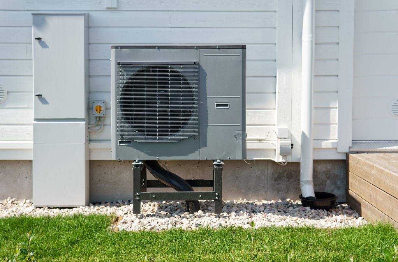 A Climate Systems professional inspecting a heating system during emergency heating repair in Valencia, PA, highlighting expertise. Emergency Heating Repair near me.
