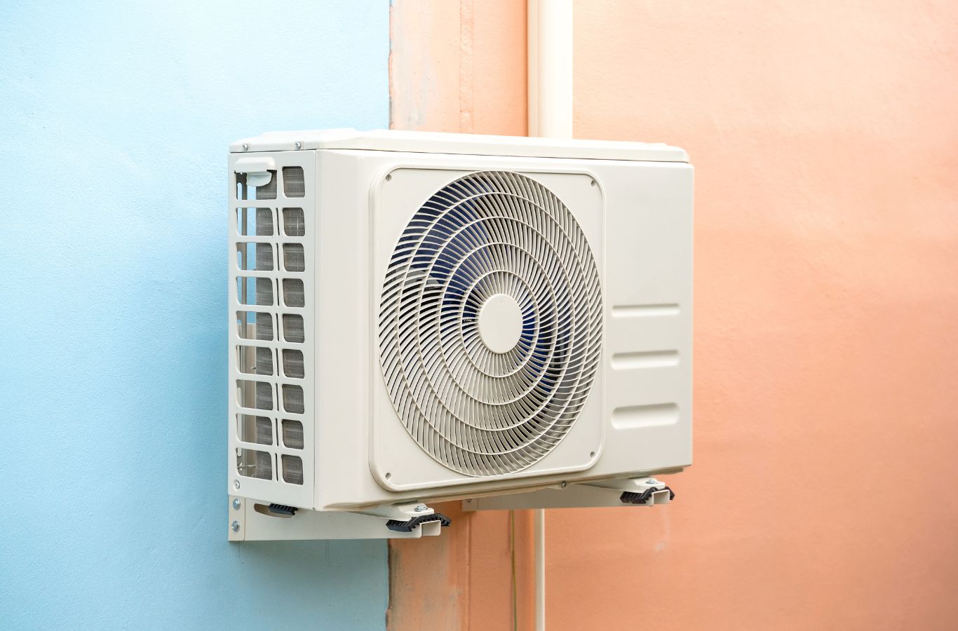 Climate Systems expert maintaining a ductless heat pump in Allison Park, PA with precision tools and professional heating and cooling expertise. Ductless Heat Pumps near me.