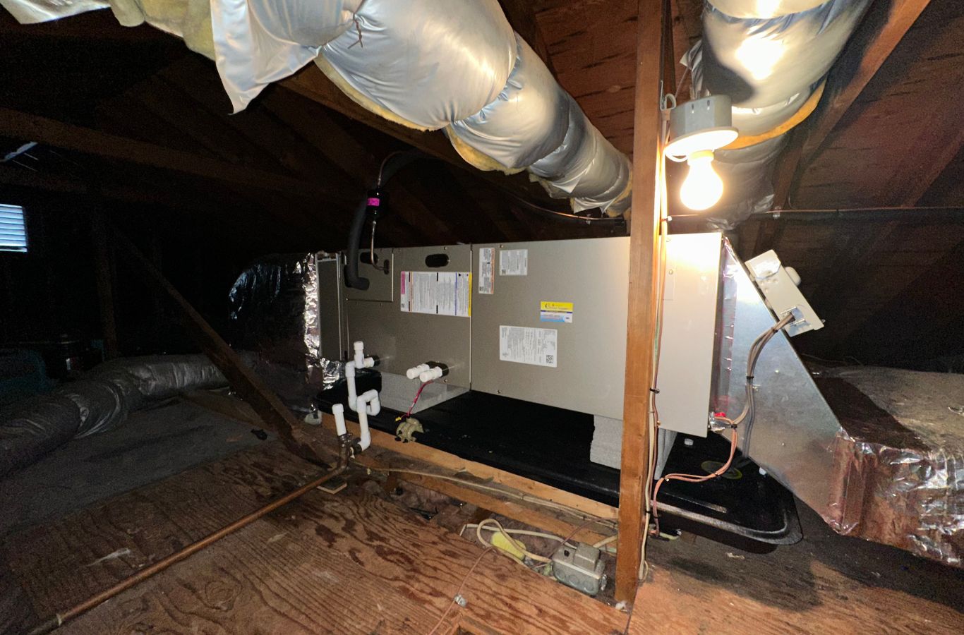Climate Systems installer setting up high-efficiency furnace system in McCandless Township, PA for reliable winter heating.