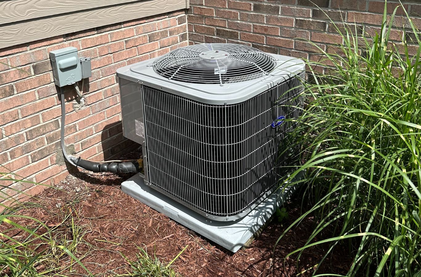 Climate Systems expert servicing a heat pump in Hampton Township, PA ensuring dependable operation. Heat Pump Maintenance Near Me