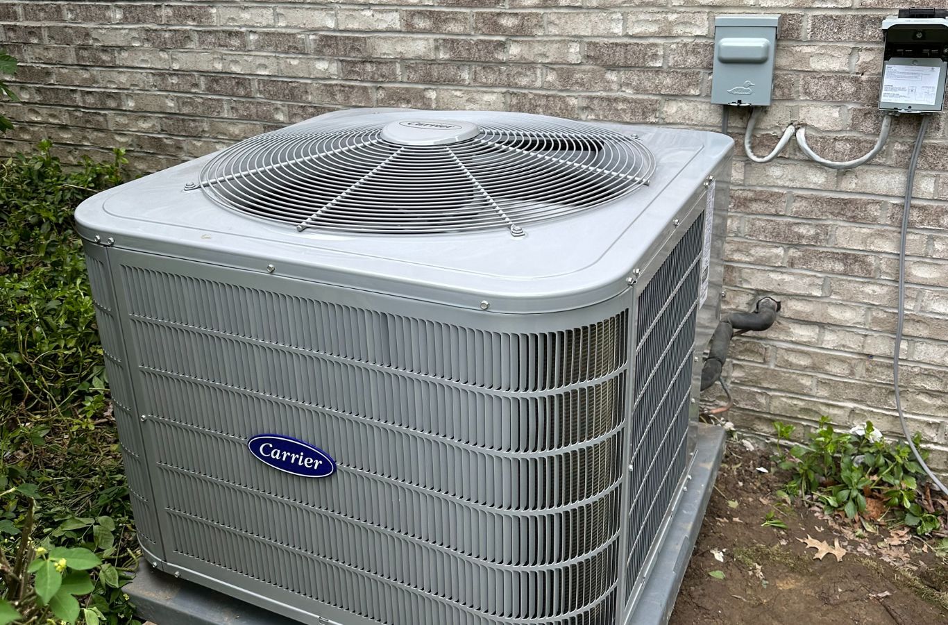 Climate Systems expert servicing a heat pump in Gibsonia, PA ensuring reliable performance. Heat Pump Maintenance Near Me