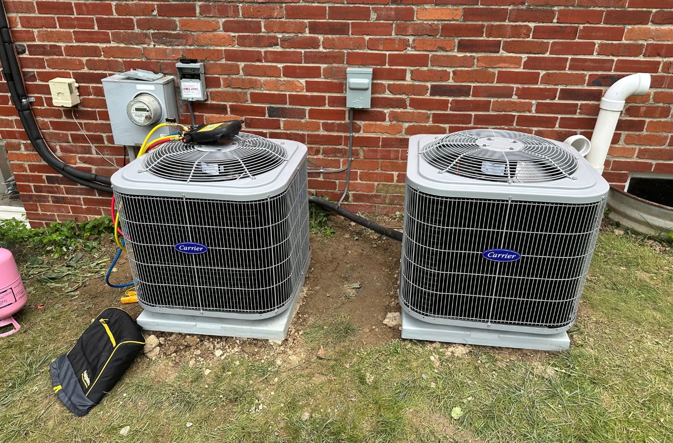 Climate Systems team maintaining a residential heat pump in Gibsonia, PA for improved system efficiency