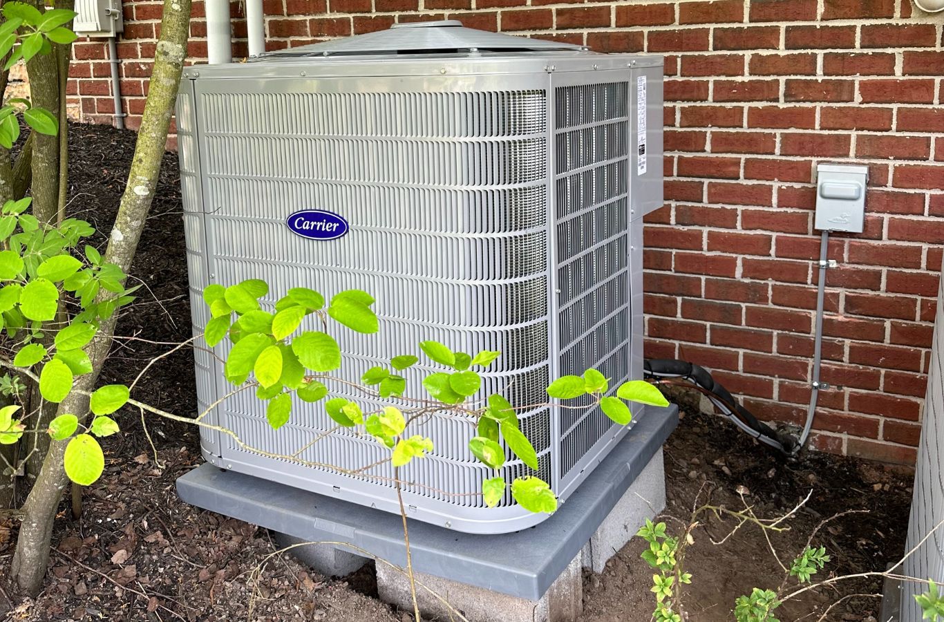 Climate Systems HVAC specialist servicing a heat pump in Hampton Township, PA to improve home comfort and energy efficiency.
