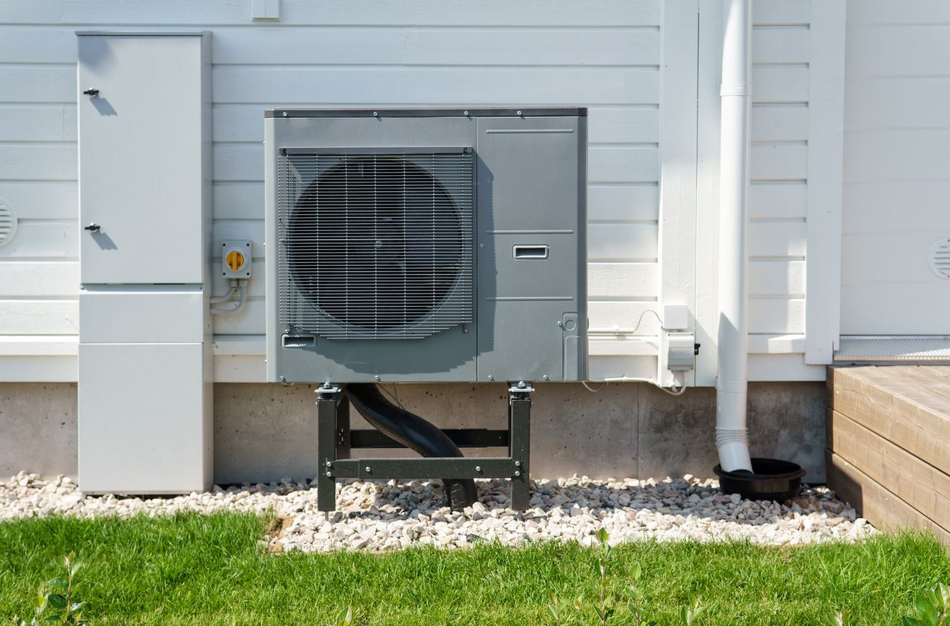 Climate Systems technician inspecting HVAC components during urgent heating and cooling service in Seven Fields, PA.